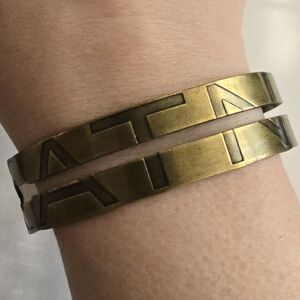 Hunger Games Katniss bracelet arrow dark gold tone 2013